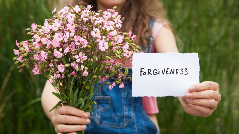 Forgivness-lady-and-flowers
